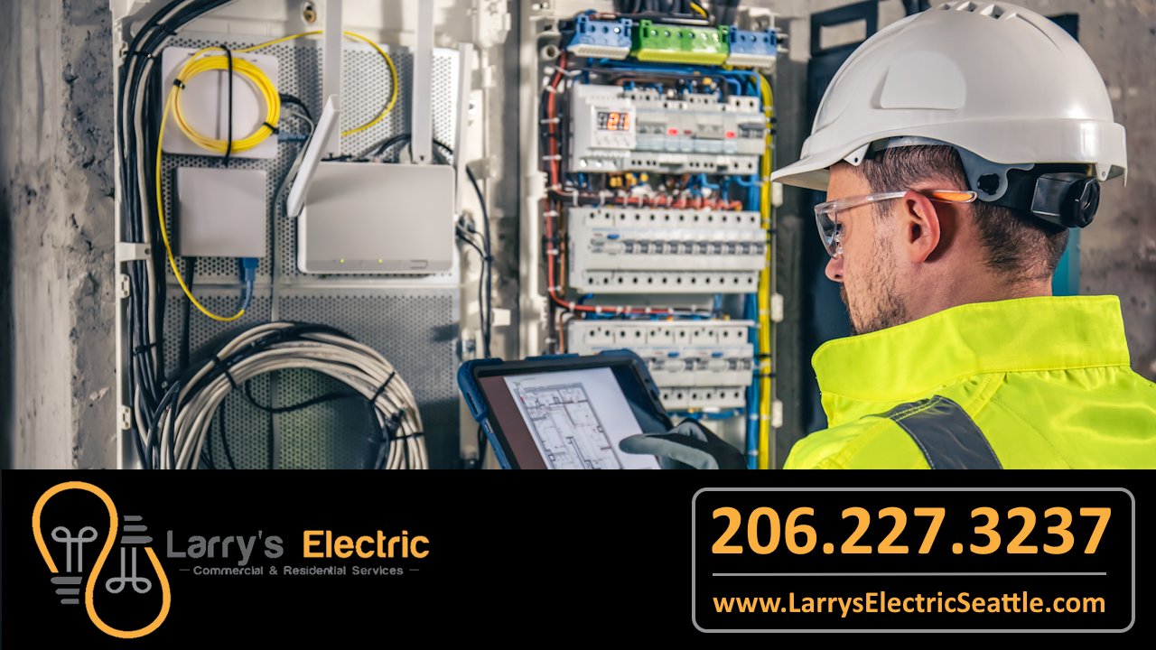 Electrician rewiring an electrical panel at a commercial building job site in Federal Way, Washington